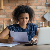 woman reading paper