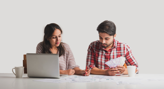 man and woman budgeting